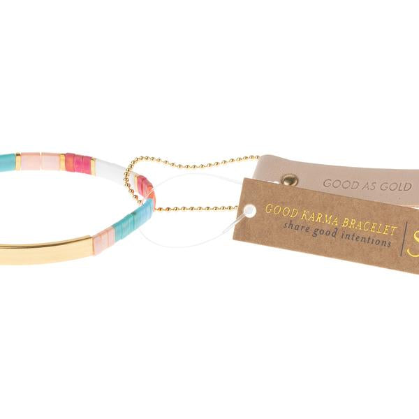 Colorful glass bracelet in miyuki style with leather hang tag stamped with &quot;Good as gold&quot;.