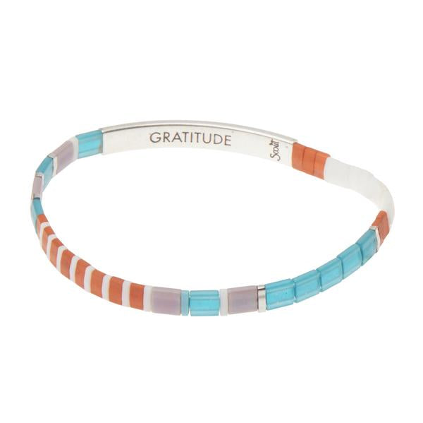 Miyuki bracelets with glass beads in turquoise and orange with silver bar engraved with "Gratitude".