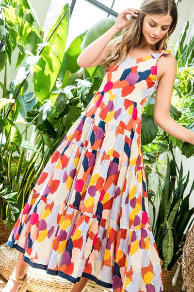 Multi colored maxi dress worn by model.