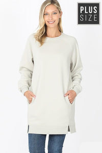 Women's plus size long tunic sweatshirt in bone color with side slits and pockets.