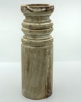 Sample of pillar candle holder tall in barrel shape.