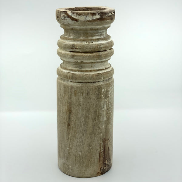 Sample of pillar candle holder tall in barrel shape.