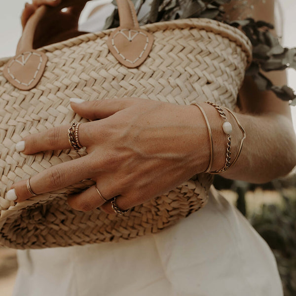 Model wearing Minimalist Gold Bracelet with Pearl for Women.