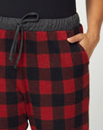 Plus size red plaid pajamas. Close up view of waist and pockets.