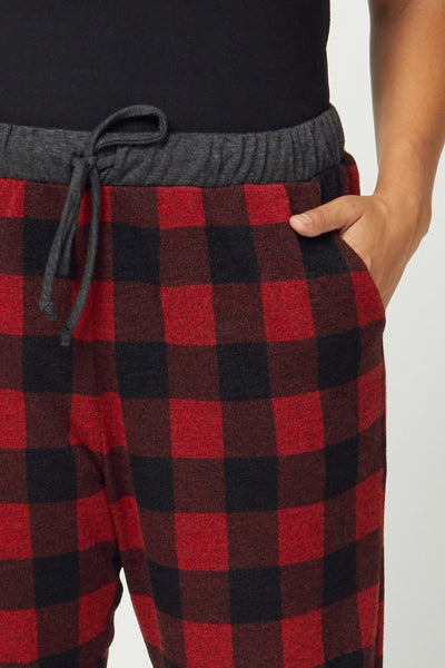 Plus size red plaid pajamas. Close up view of waist and pockets.