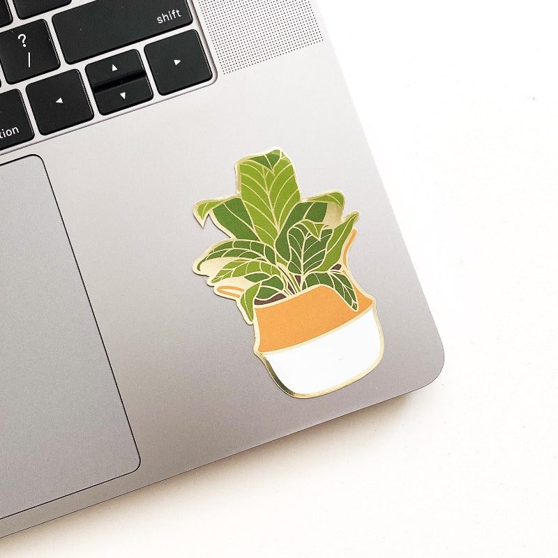 Tropical plant stickers. Banana leaf plant shown on laptop.
