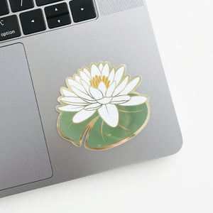 Water lily sticker shown on laptop.