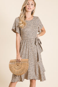 Women's animal print dresses in tan cheetah print.