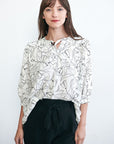 Womens black and white blouse.