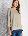 Women's loose fit tops. Hi-low split side hem.