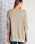 Women's loose fit tops. Back view.