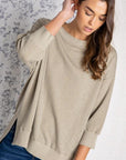 Women's loose fit tops. Olive colored rib knit.