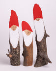 Wooden Santa logs in medium size. 4-9 inches tall.