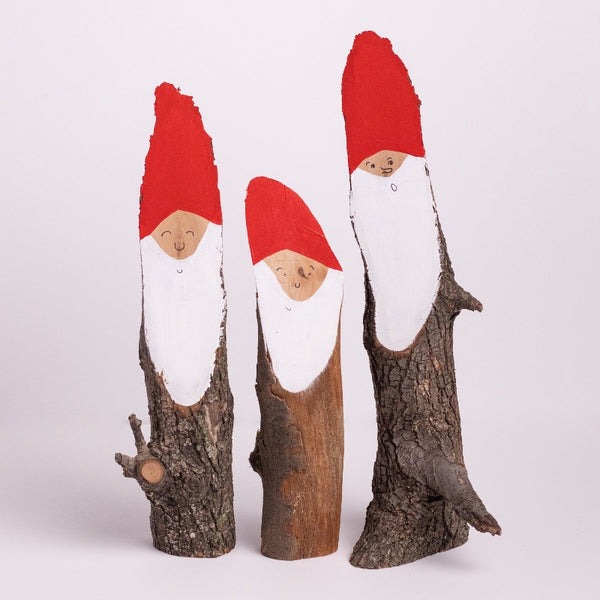 Wooden Santa logs in medium size. 4-9 inches tall.